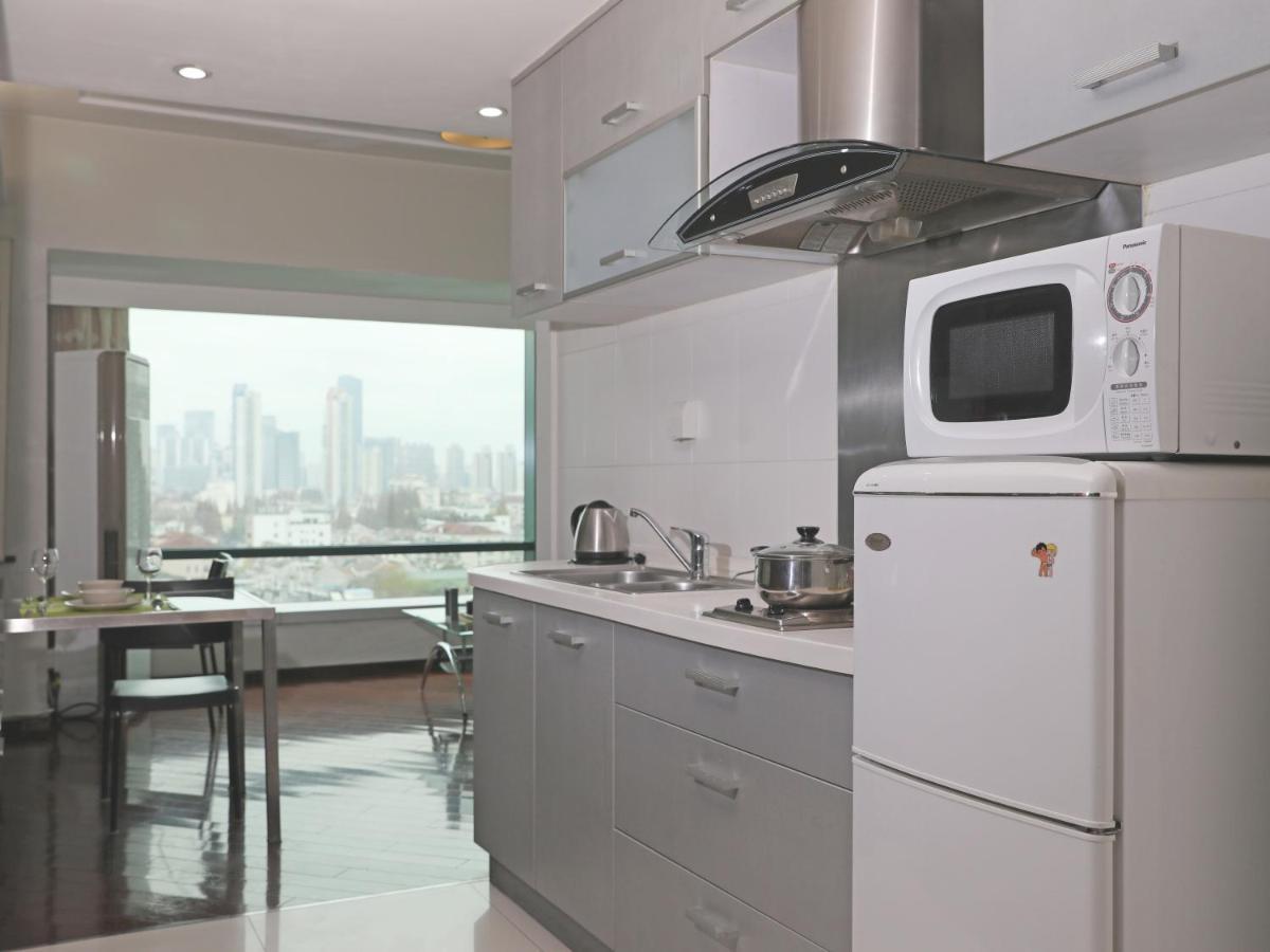 Shanghai Cosmo World Union Service Apartment Buitenkant foto