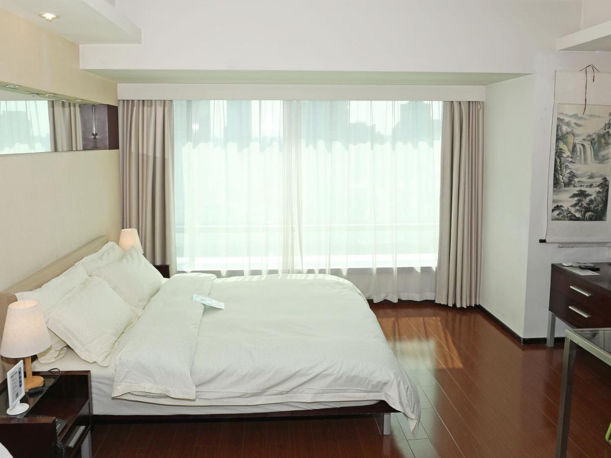 Shanghai Cosmo World Union Service Apartment Buitenkant foto