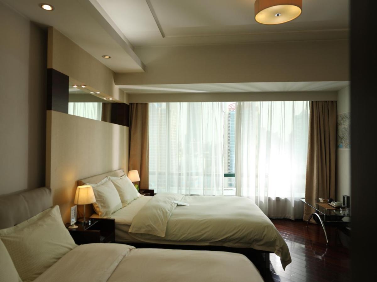 Shanghai Cosmo World Union Service Apartment Buitenkant foto